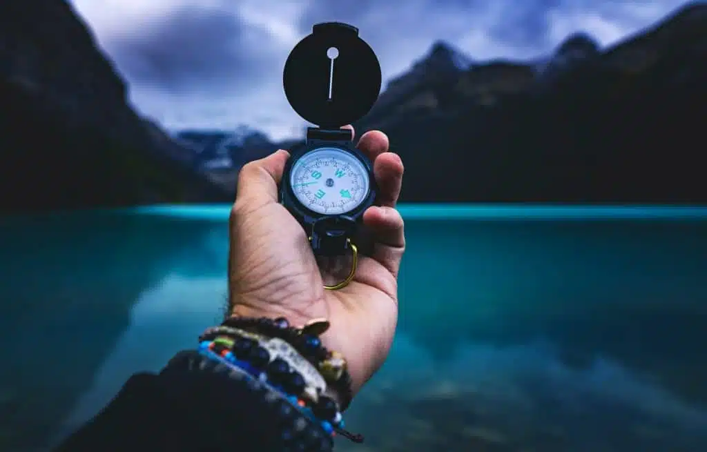 career365.com.au_Outplacement_holding a compass in front of a landscape